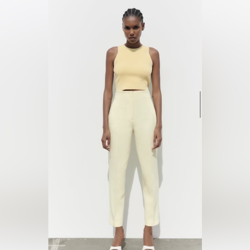 Brand new HIGH-WAISTED PANTS never worn! Tag taken off. Light yellow.